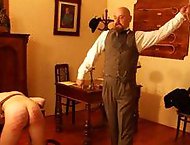   Period Headmaster restrains & severely canes naked student 